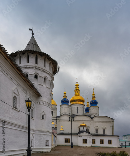 The majestic churches of the Tobolsk Kremlin (Siberia, Russia) on a cloudy autumn day. Close-up, vertical photo.