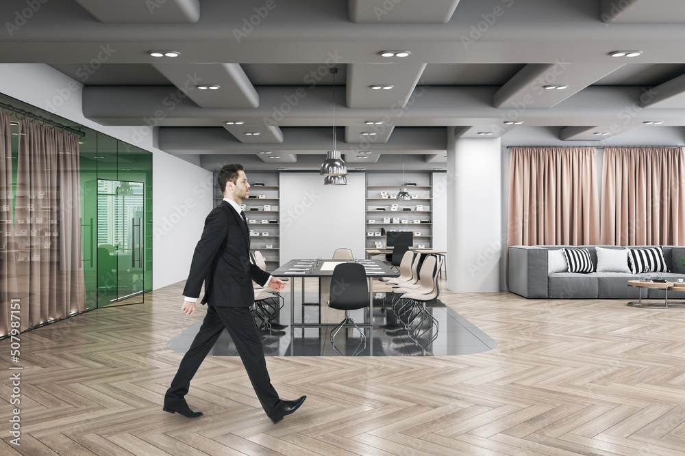 Attractive thoughtful young european businessman walking in wooden and concrete office interior with furnituire and window with city view. CEO, executive and consulting concept. Attractive thoughtful young european businessman walking in wooden and concrete office interior with furnituire and window with city view. CEO, executive and consulting concept.