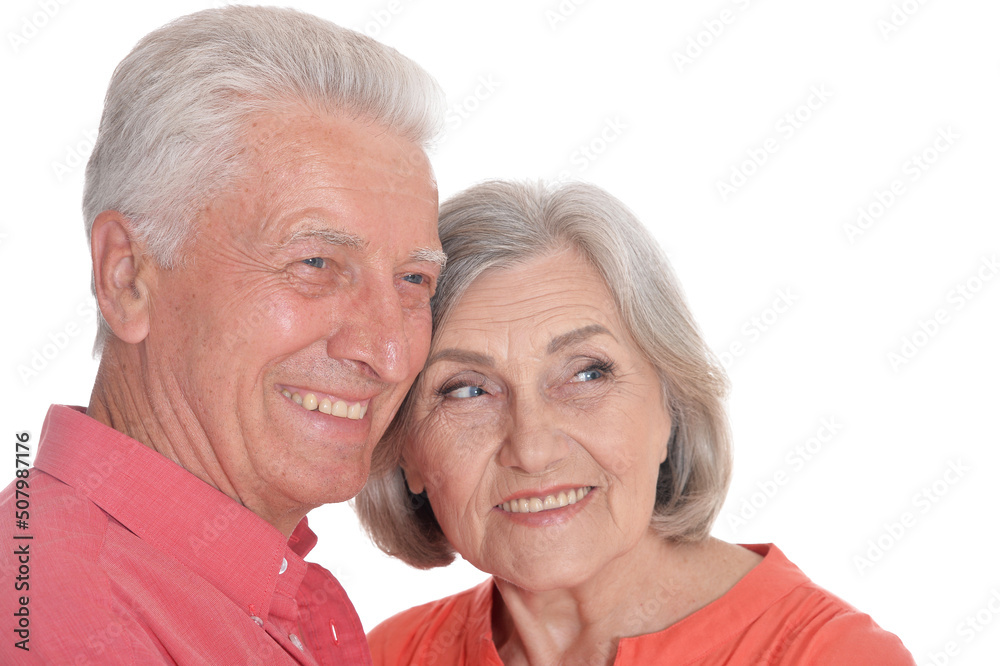 Close-up portrait of smiling senior couple wearing bright clothing Close-up portrait of smiling senior couple wearing bright clothing