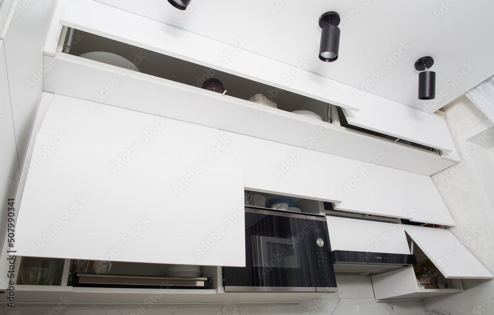 Organization of storage of utensils in the kitchen. Modern headset and planning for the manufacture of a section and drawers in the kitchen. Convenience of the location of dishes. Organization of storage of utensils in the kitchen. Modern headset and planning for the manufacture of a section and drawers in the kitchen. Convenience of the location of dishes.