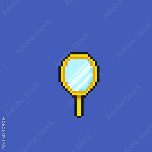 golden hand mirror in pixel art style