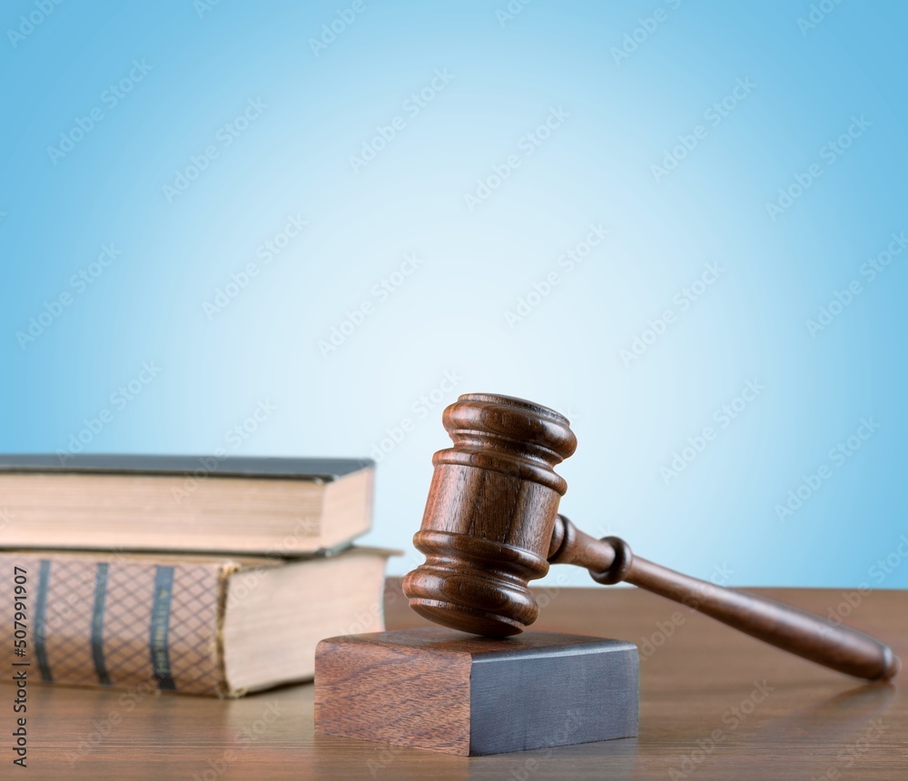 Judge gavel on law books in court, law and justice concept. Judge gavel on law books in court, law and justice concept.