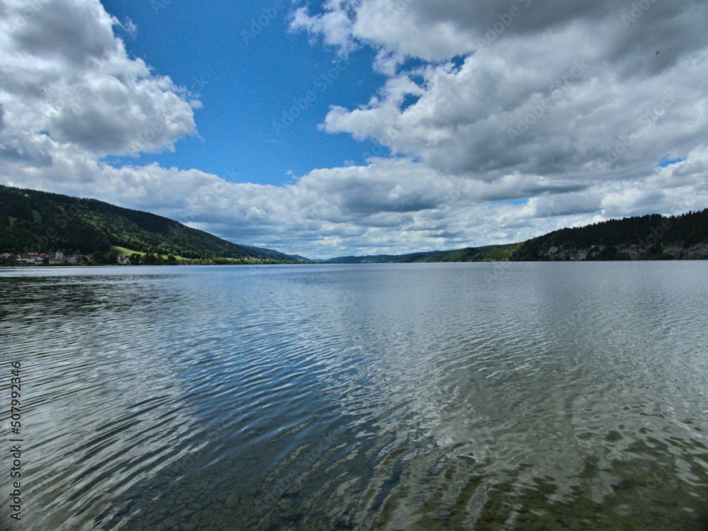 Lac de Joux, Switzerland - May 2022: Hiking around the beautiful Lac de Joux in the Swiss Jura Mountains