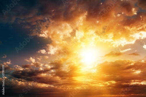 Sunlight sun rays shining through clouds in dark. © BillionPhotos.com