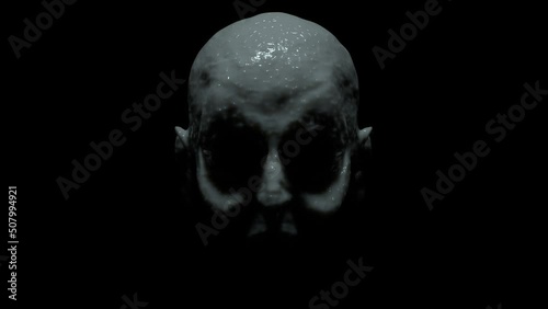 Creepy pale creature without eyes raise its head on black background 3d 4k animation. Halloween monster with spooky skin in the darkness. Face close-up photo