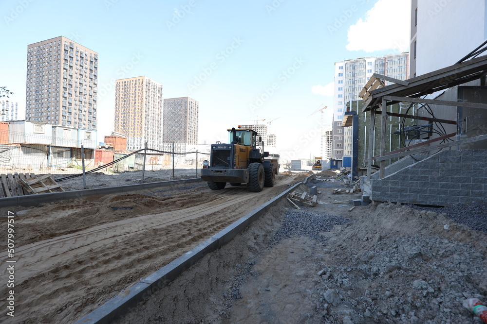 Naklejka premium Photos of the construction process of the residential complex