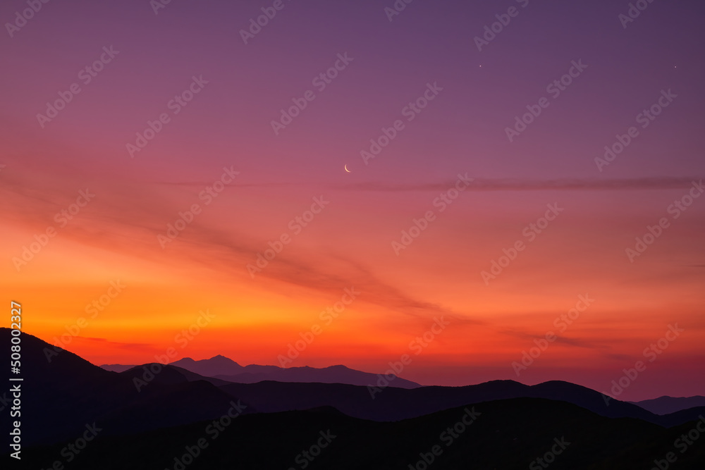 Scenic view of the mountains during sunrise