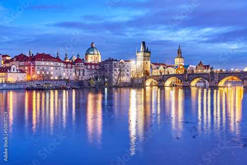 View across the Vltava river on the Charles Brdige and the Old Town Bridge Tower in Prague, Czech Republic
