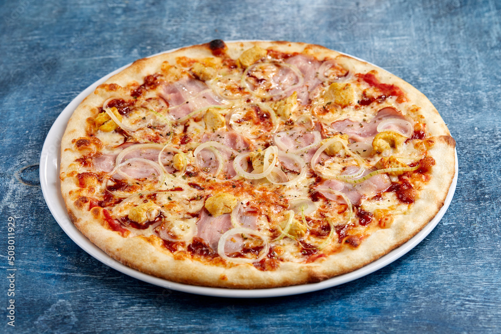 tasty italian pizza on wooden background