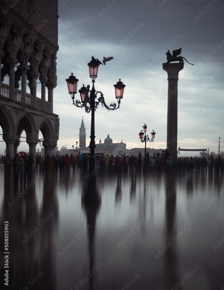 Fototapeta premium Famous Doge palace and column with winged lion in Venice