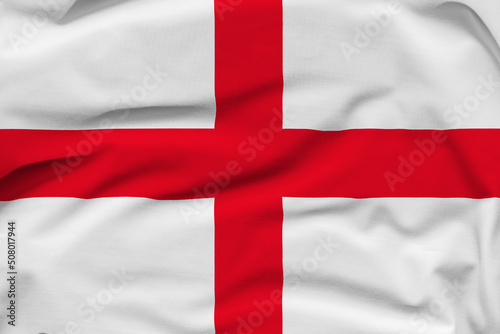 England national flag, folds and hard shadows on the canvas