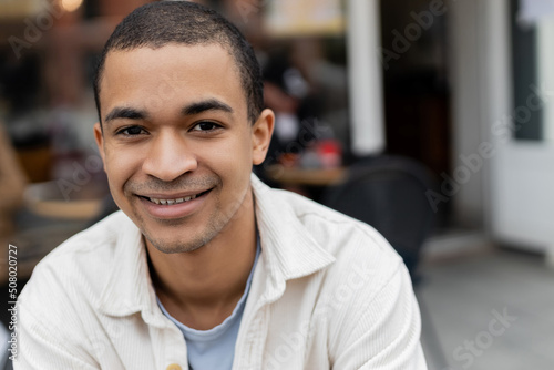 portrait of cheerful african american man looking at camera.