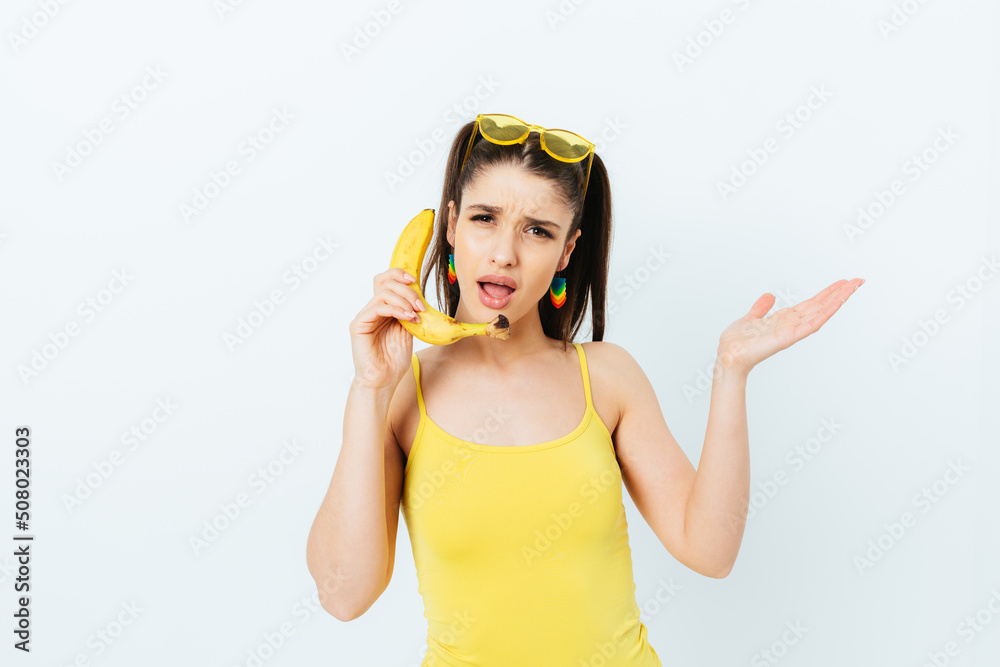 Portrait of unhappy young brunette woman talking Portrait of unhappy young brunette woman talking