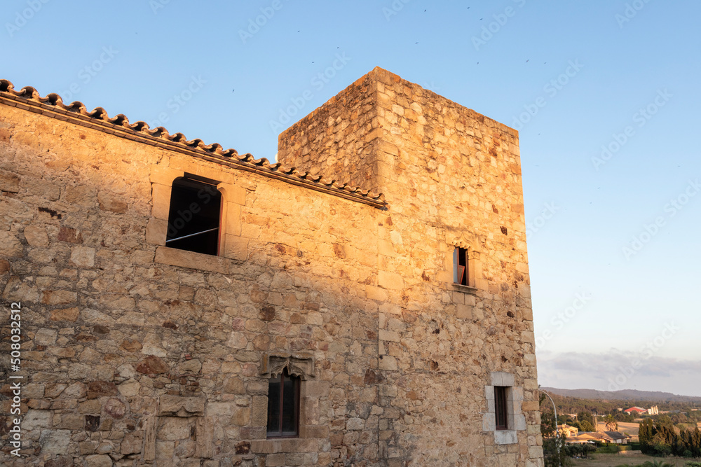 stone tower in the medieval town of pals on the costa brava