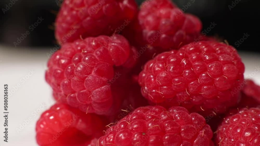 Close-up of fresh raspberries. Beautiful raspberry background. Macro raspberry. Close-up of fresh raspberries. Beautiful raspberry background. Macro raspberry.