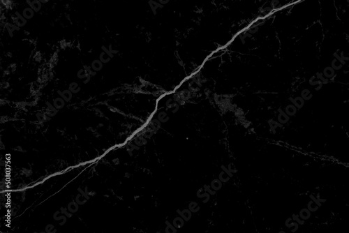 Black marble background with white nature patterns texture