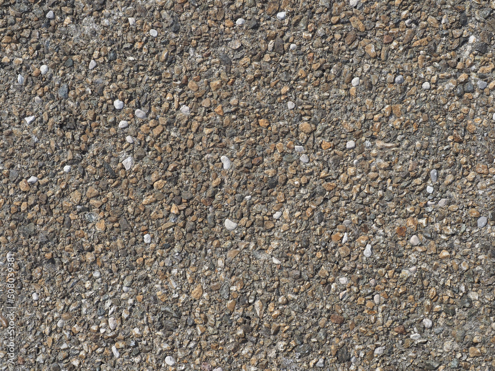 grey pebbles set into concrete texture background grey pebbles set into concrete texture background