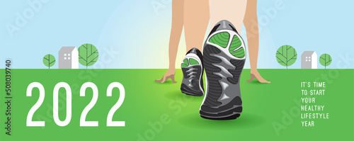 2022 - it`s time to start your healthy lifestyle year, vector banner with athlete starting running outdoor. CloseUp foots, sportive shoes, sneakers soles on green grass at spring or summer landscape