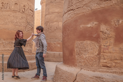 Couple dancing at the temple of Karnak in Luxor, Egypt.