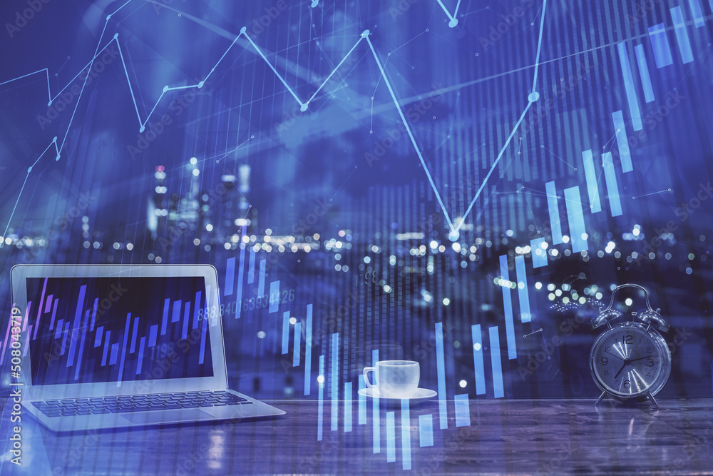 Forex market graph hologram and personal computer on background. Multi exposure. Concept of investment. Forex market graph hologram and personal computer on background. Multi exposure. Concept of investment.