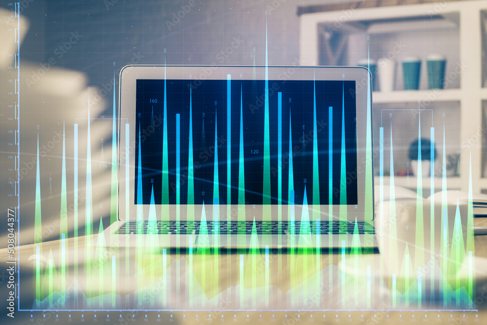 Forex market graph hologram and personal computer on background. Multi exposure. Concept of investment. Forex market graph hologram and personal computer on background. Multi exposure. Concept of investment.