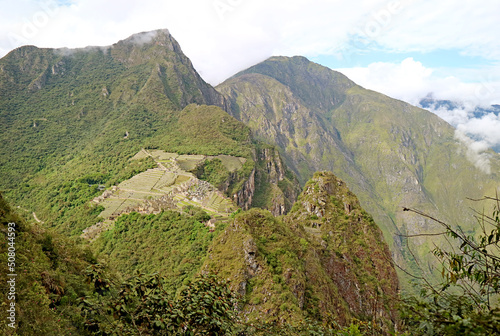 Condor Shaped Machu Picchu Incas citadel ruins as seen from the slope of Mt. Huayna Picchu, Urubamba province, Peru, South America