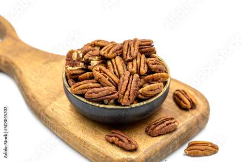 Pecan walnuts on white background. close up