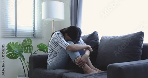 Asian women with stress, She kept herself alone in her bedroom, Depression.