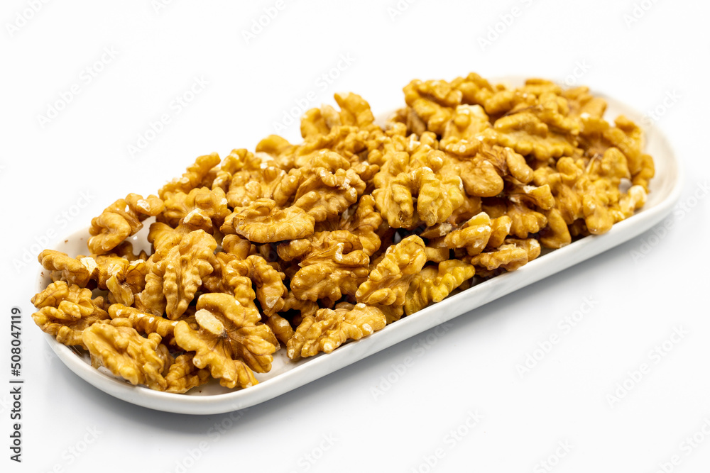 Walnut on white background. Close-up walnut kernel Walnut on white background. Close-up walnut kernel