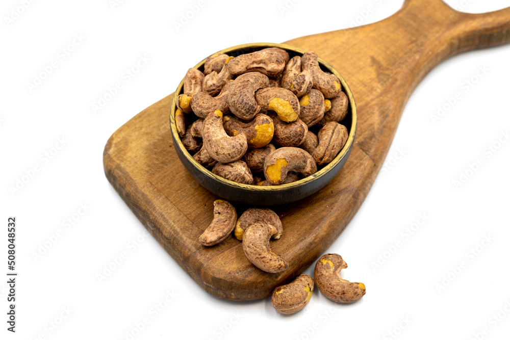 Shelled cashew on white background. Close-up of fresh cashews Shelled cashew on white background. Close-up of fresh cashews