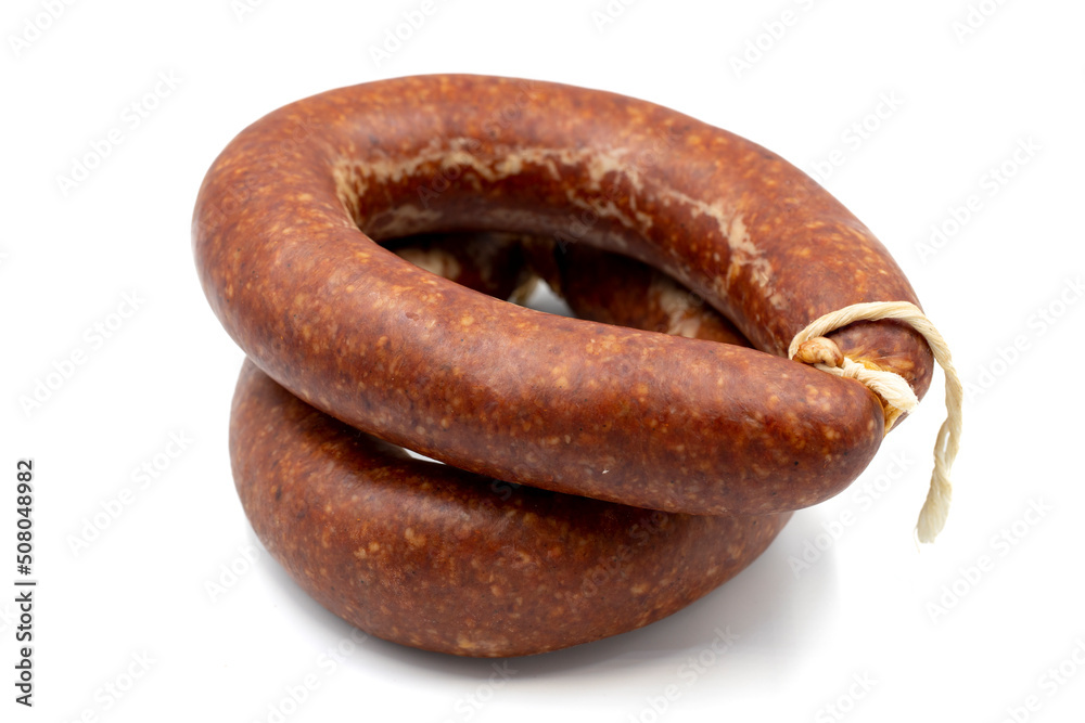 Sausage on a white background. Close-up spicy Turkish sausage Sausage on a white background. Close-up spicy Turkish sausage