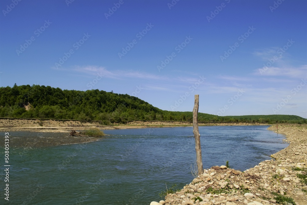 river and rocky shore