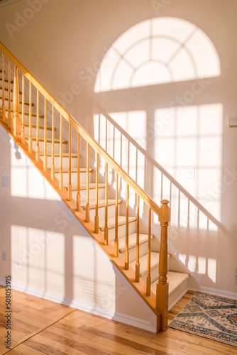 Sunshine modern natural yellow wooden stairs in new house interior - Image