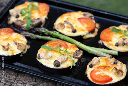 oven baked eggplant with mushrooms and cheese, tomato
