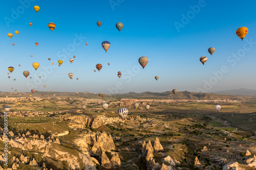 hotair ballons in the morning sky above Cappadocia