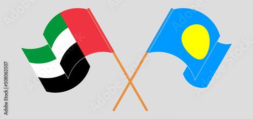 Crossed and waving flags of the United Arab Emirates and Palau