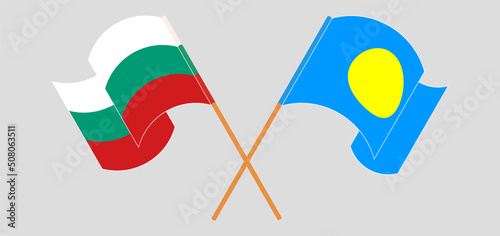 Crossed and waving flags of Bulgaria and Palau