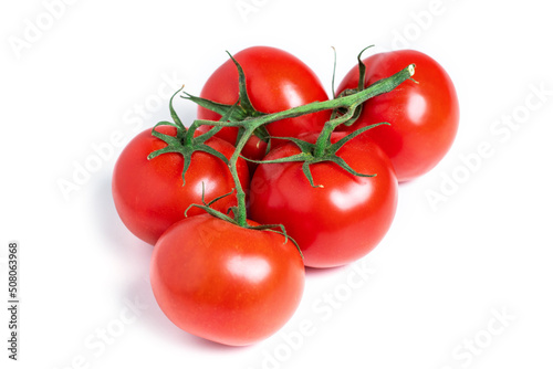 A brush of large tomatoes on a white background. Studio photo, isolate, tomatoes, washed