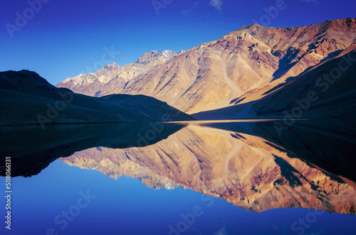 Reflection of mountains in Chandra Taal, Spiti, Himachal, India photo