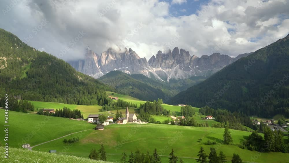 View on a village in the mountains of Italian Dolomites View on a village in the mountains of Italian Dolomites