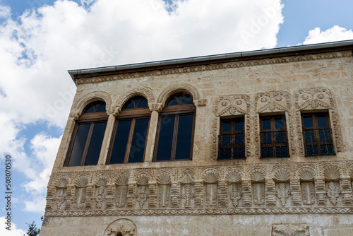 Beautiful facade of a greek old mansion with stone carving in Mustafapasa, Nevsehir, Cappadocia, Turkey