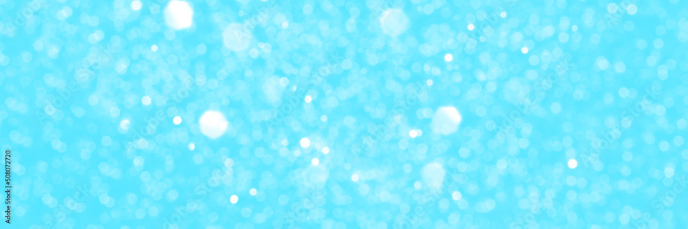 Bright blue sparkling glitter bokeh background, banner texture. Abstract defocused lights header. Wide screen wallpaper. Panoramic web banner with copy space for design
