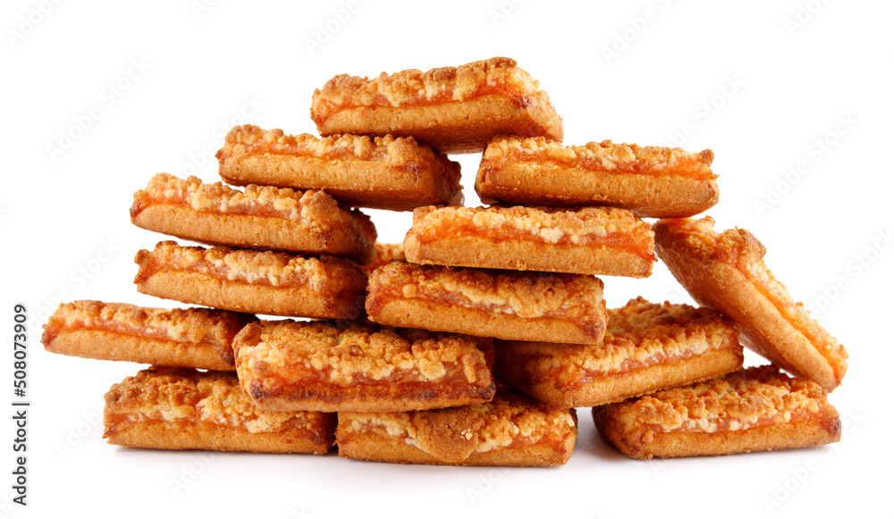 Orange cookies. Cookies with orange filling . The orange cookie tower is isolated on a white background .