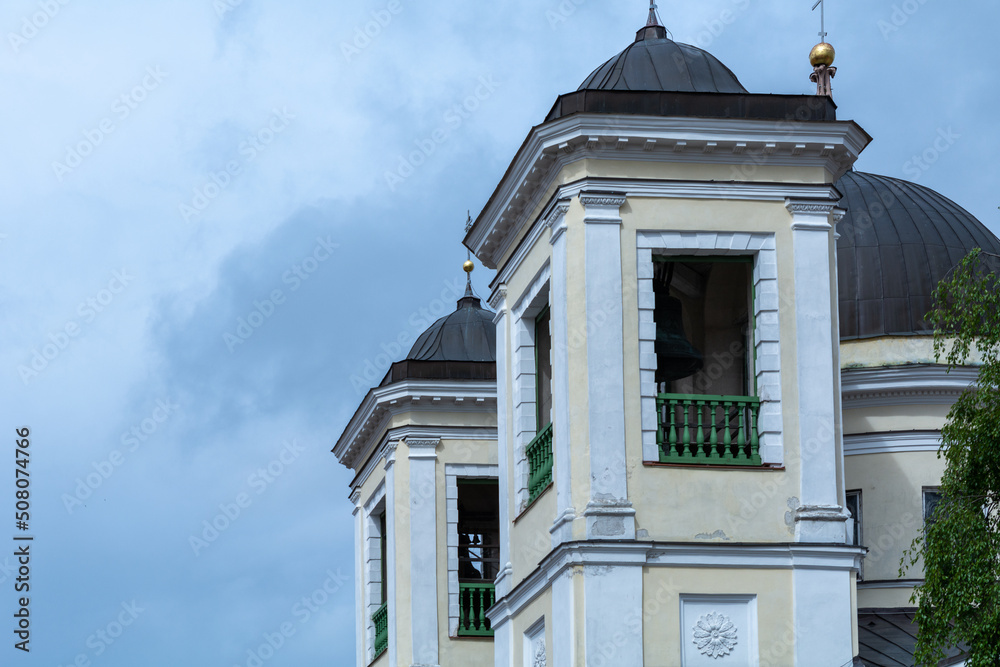 Bell-tower of a Russian orthodox church against a dramatic sky Bell-tower of a Russian orthodox church against a dramatic sky