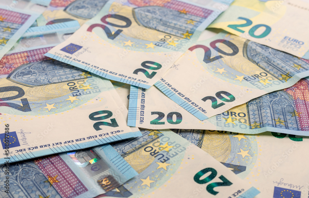 Banknotes of twenty euros laid out on the table. Banknotes of twenty euros laid out on the table.