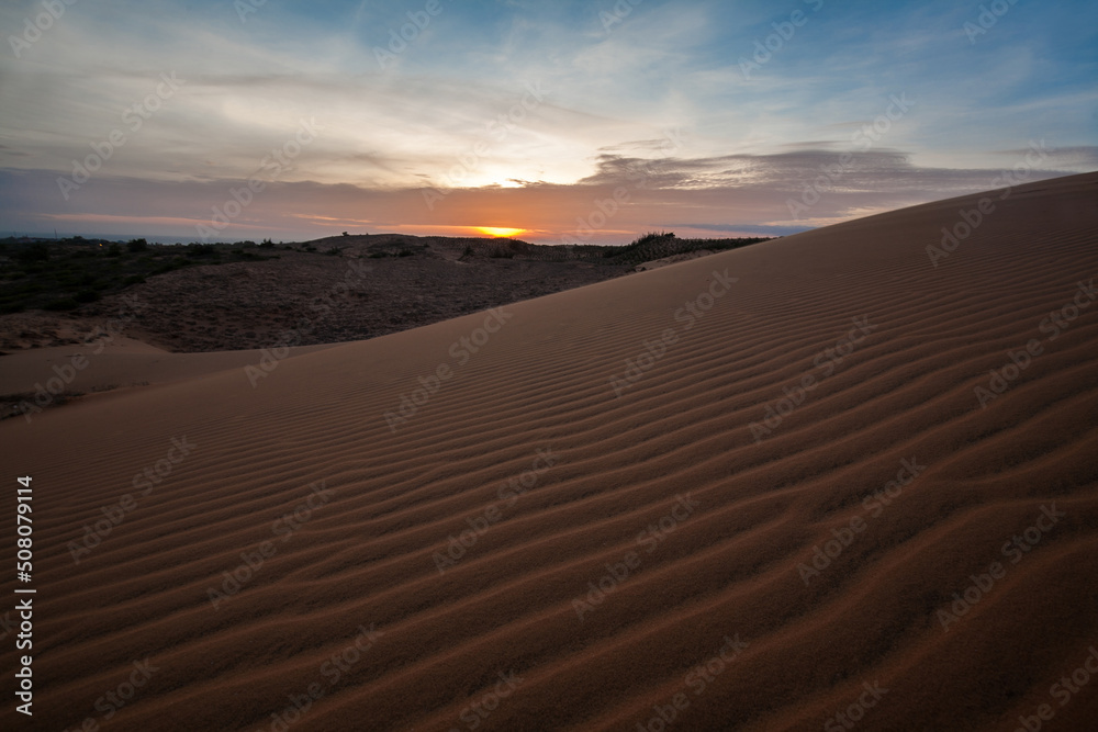 Sunset at Red Sand Dune, Desert in Mui Ne, Vietnam