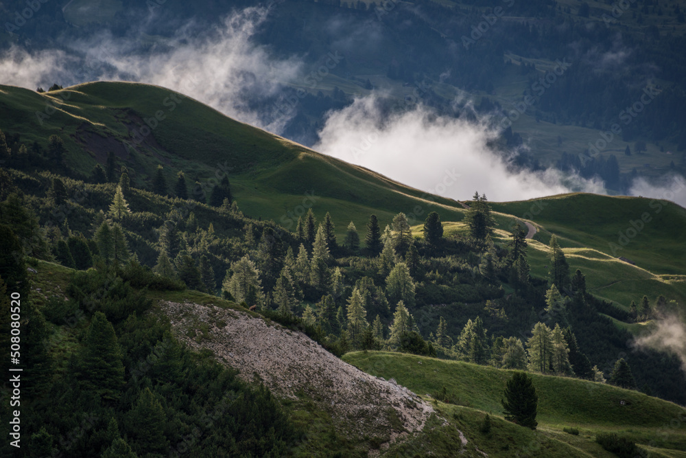 Fototapeta premium Mountains above Val Gardena mountain pass in the Dolomites