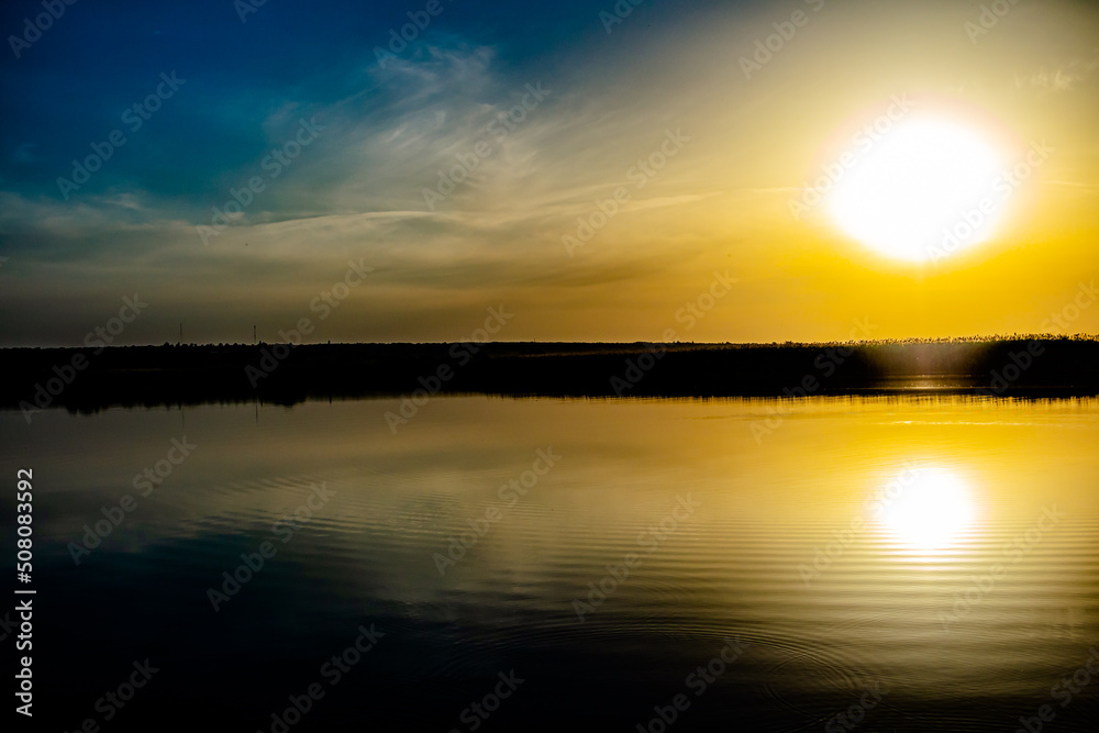Fototapeta premium Beautiful sunset on the river, Ukrainian nature, landscape