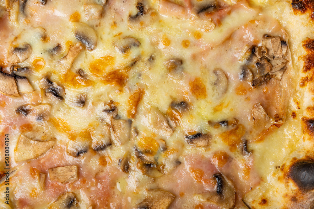 Delicious hot and fragrant pizza with prosciutto Cotto and mushrooms Pizza in a box. Pizza delivery. Pizza background.Top view. Copy space.Italian food.