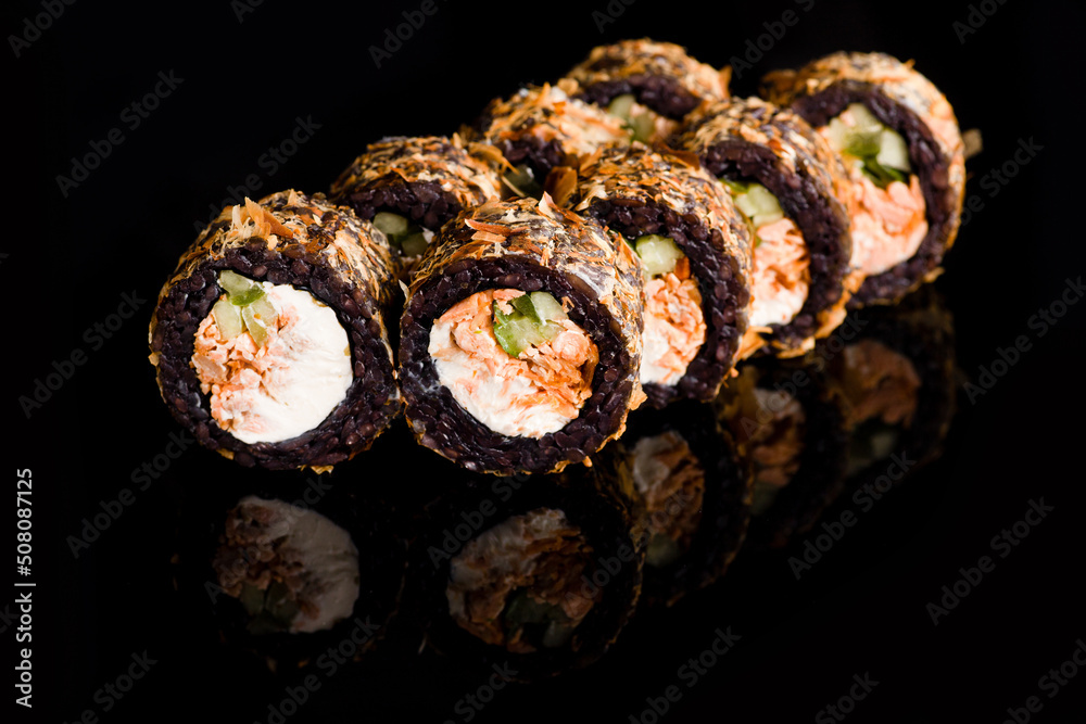 Sushi, rolls, sushi on a black background, mussels Sushi, rolls, sushi on a black background, mussels